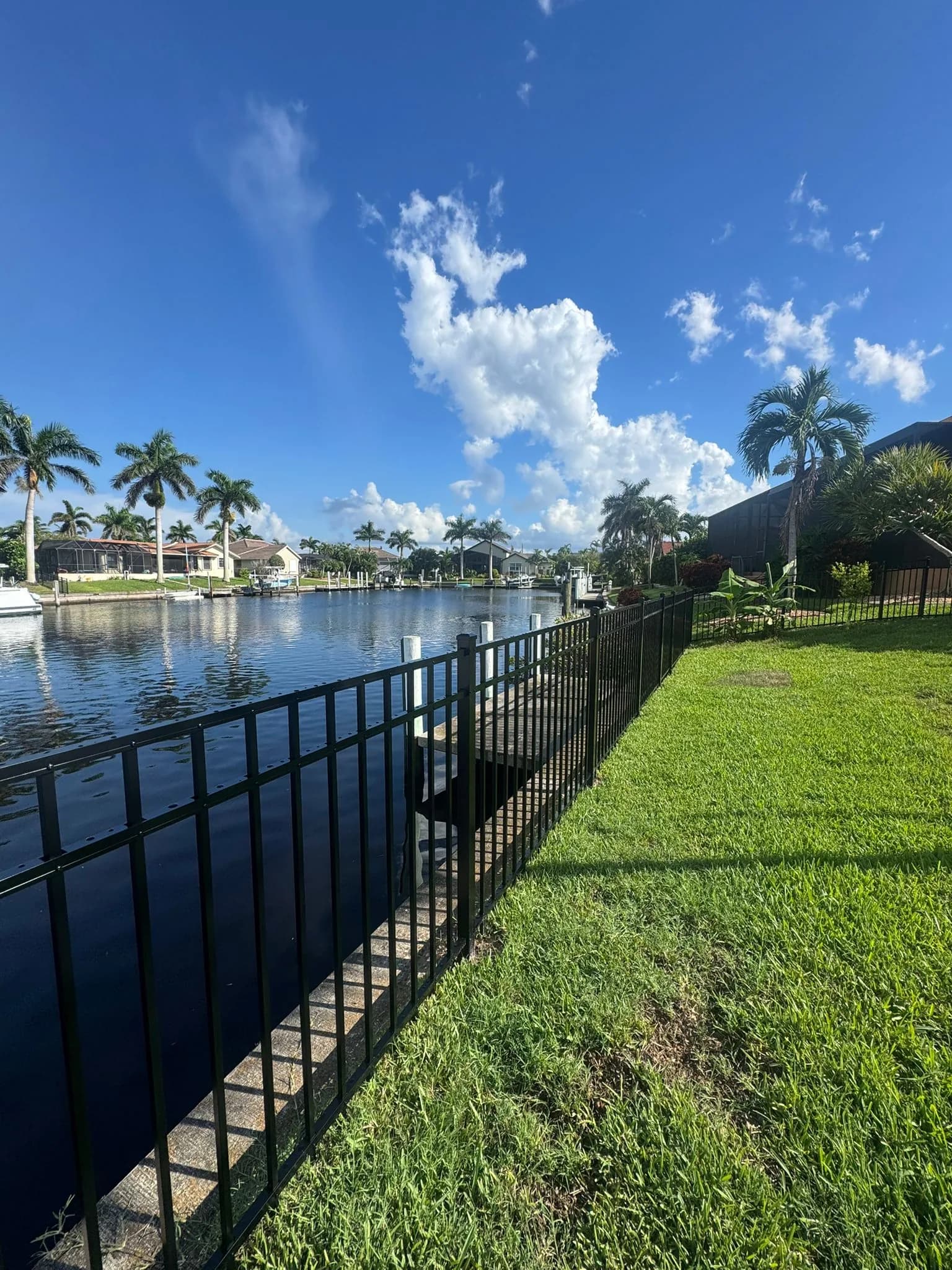 Aluminum fence near a waterfront property