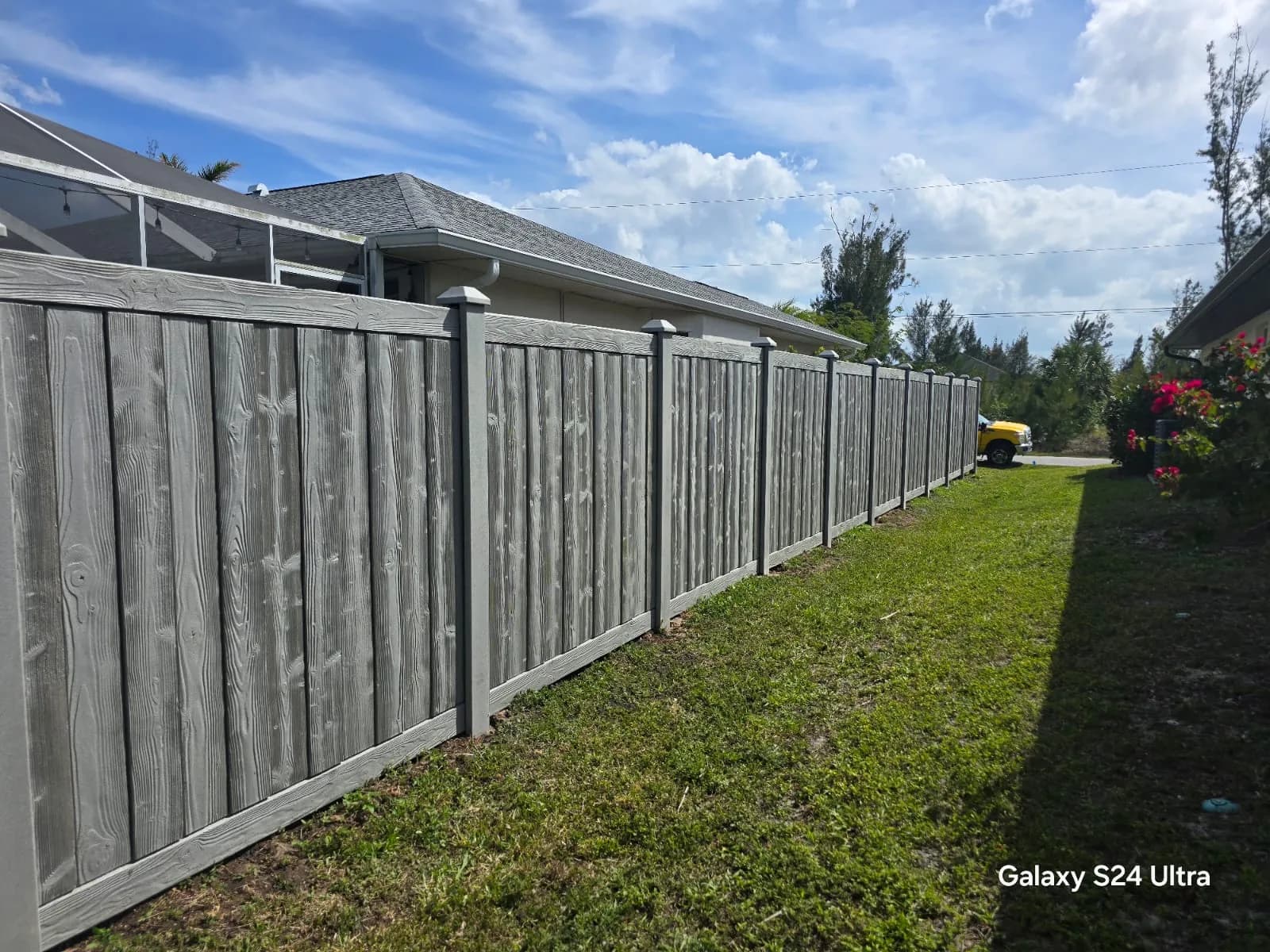 Completed composite fence installed by True Fence Florida
