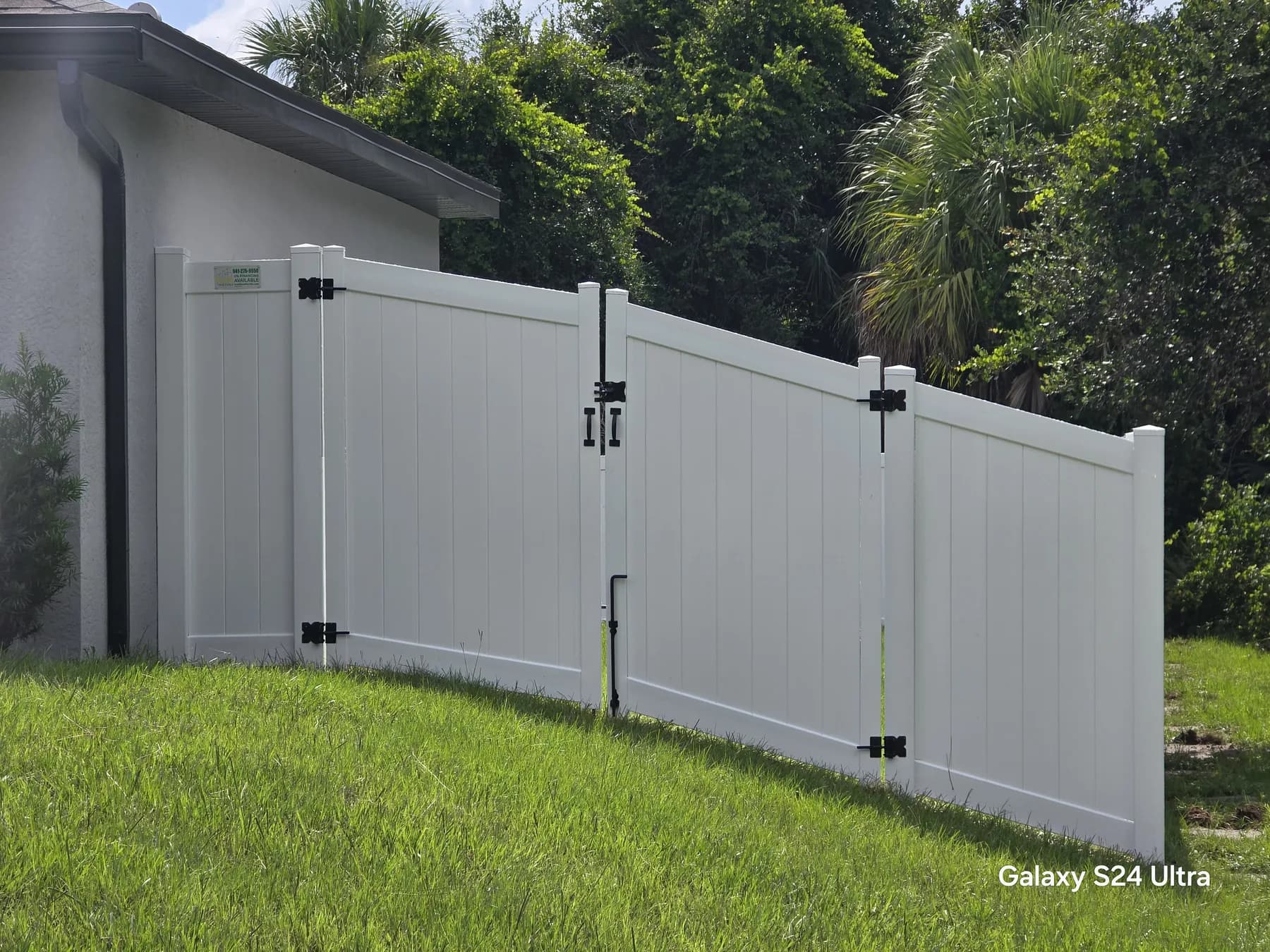 Completed vinyl fence installed by True Fence Florida