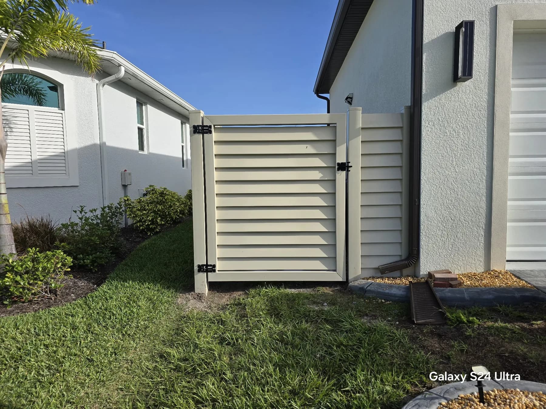 Vinyl fence around residential property